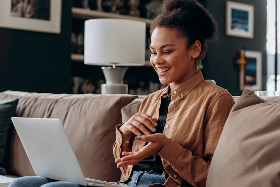 Content and happy woman looking away, sitting in a cozy setting